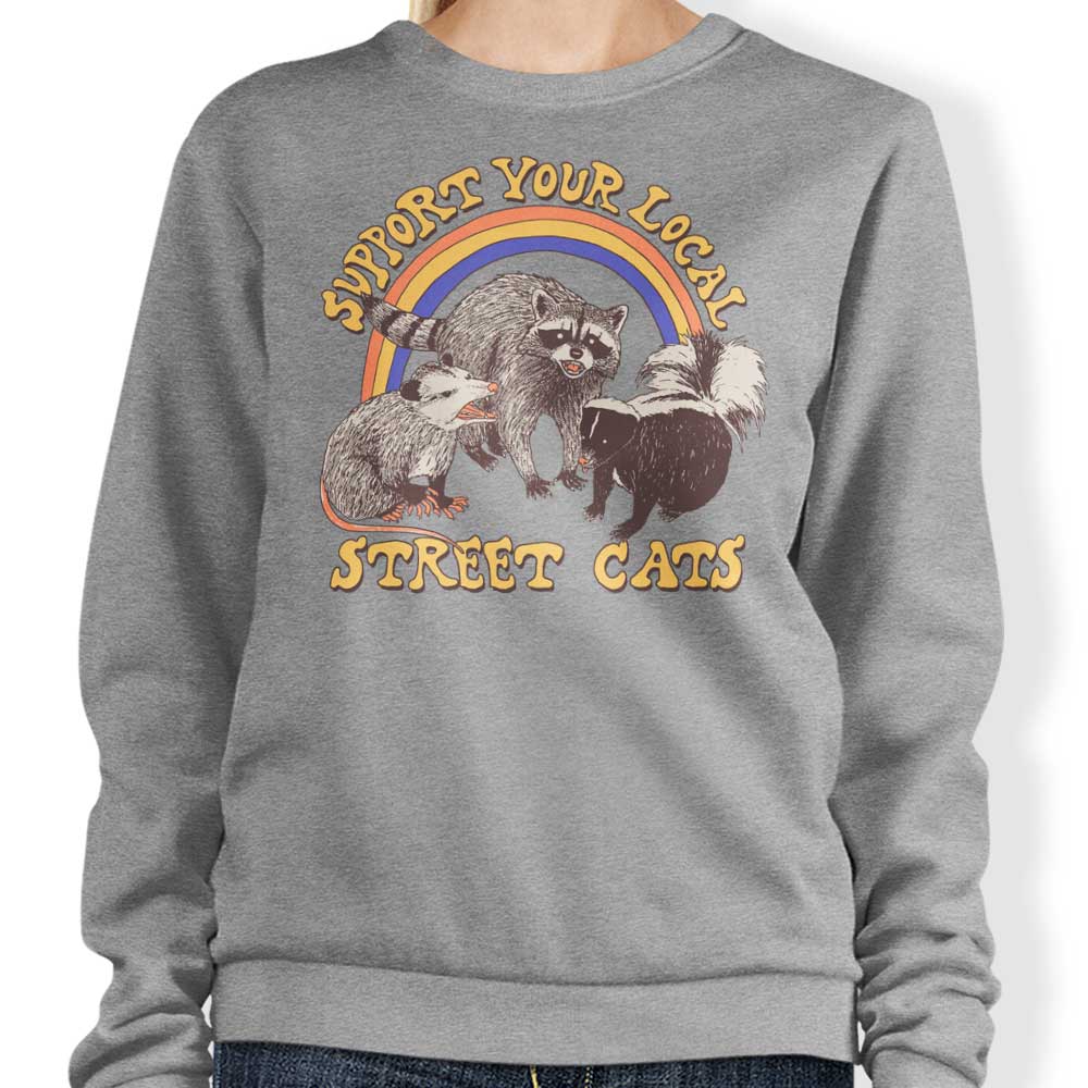 Hillary White's Street Cats-themed Sweatshirt for Fashion Enthusiasts
